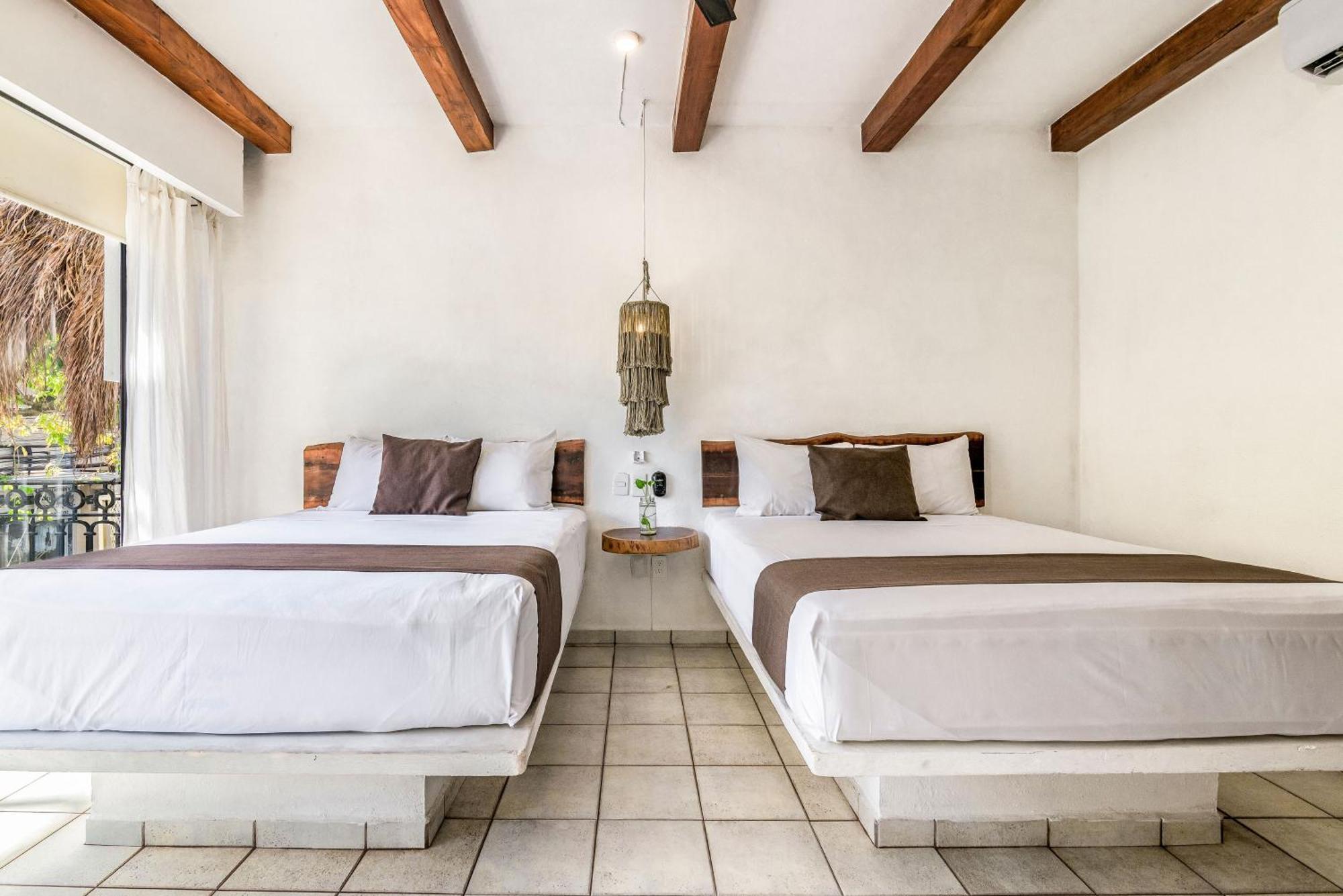 Quarto Deluxe com Cama de Casal ou 2 de Solteiro
